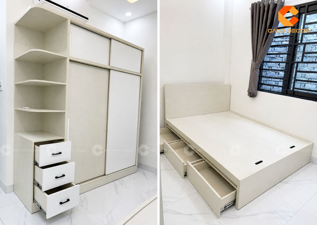 Phòng ngủ thứ nhất nổi bật với tủ cửa lùa màu gỗ phối trắng