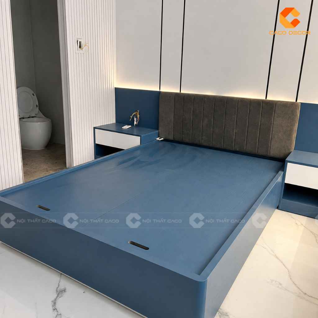 Giường ngủ xanh đậm đầu giường bọc nệm tại công trình Phương Hoàng